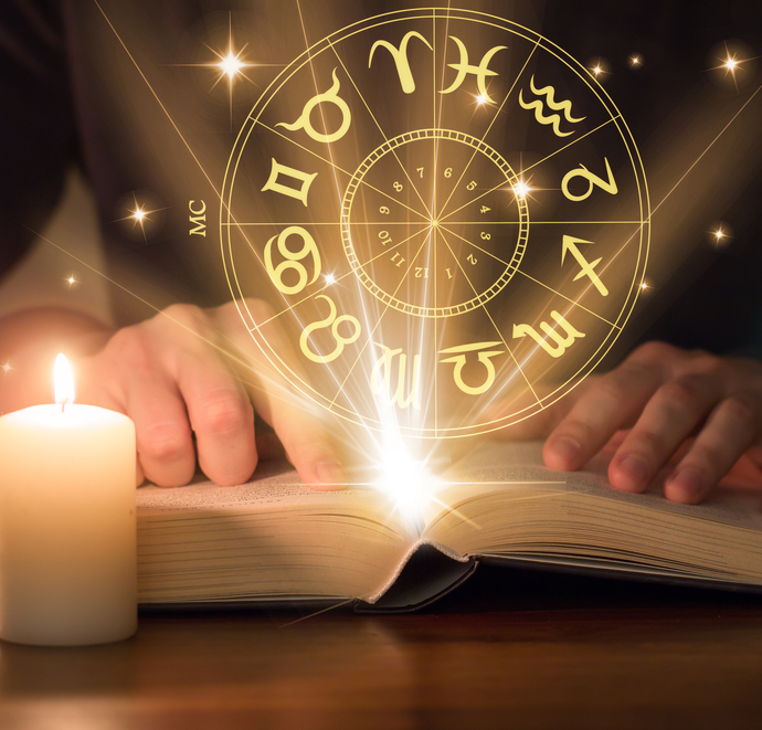 horoskop, świeca, książka